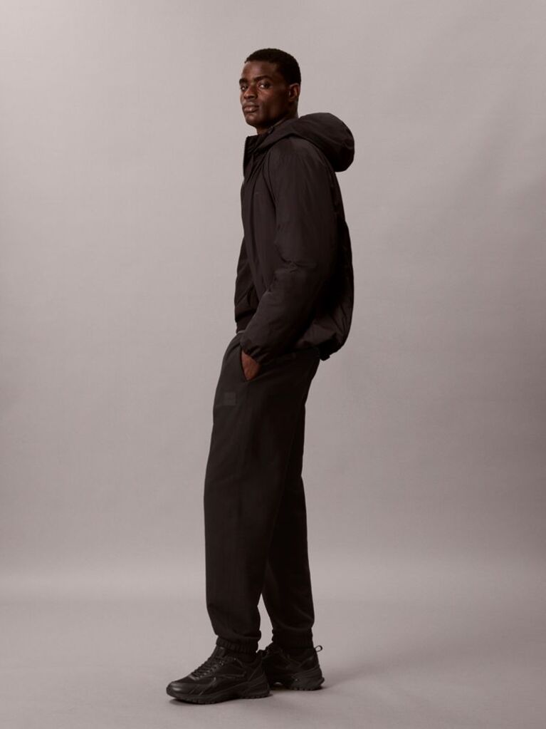 Negru Pantaloni Jogger Din Terry Cu Logo Cauciucat Si Mansete La Glezna  Barbati