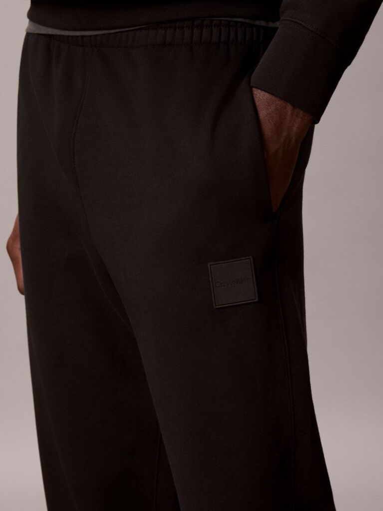 Negru Pantaloni Jogger Din Terry Cu Logo Cauciucat Si Mansete La Glezna  Barbati